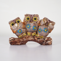 WiseCharm™ Owl Family Showpiece – Resin Decor with Artistic Detailing