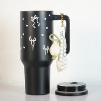 Aesthetic Bow Print Black Stainless Steel Tumbler with Floral Charm