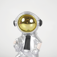 SpaceVibe™ Silver Astronaut Figurine – Metallic Resin Showpiece