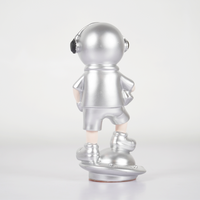 SpaceVibe™ Silver Astronaut Figurine – Metallic Resin Showpiece
