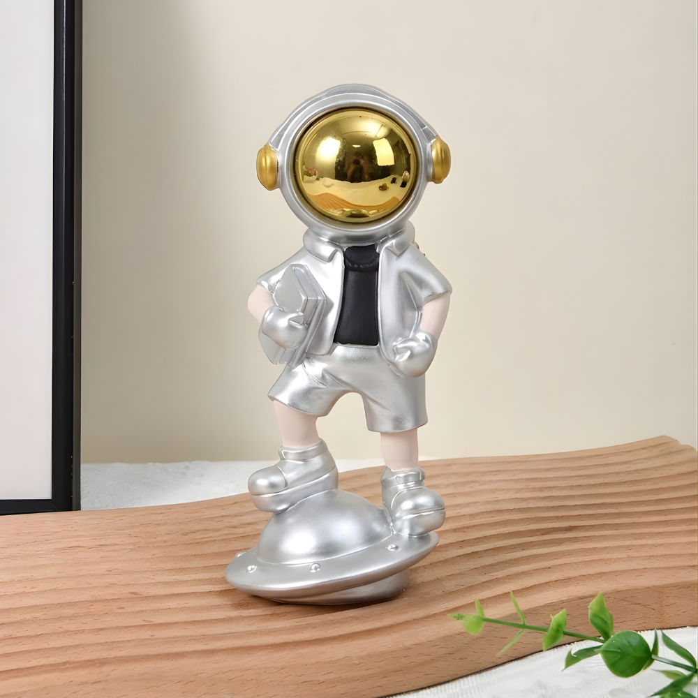 SpaceVibe™ Silver Astronaut Figurine – Metallic Resin Showpiece