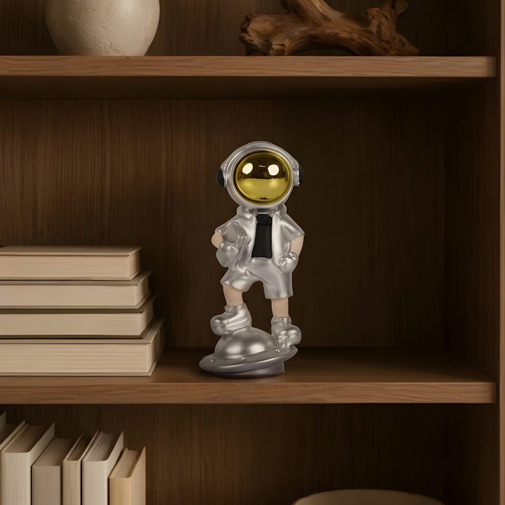 SpaceVibe™ Silver Astronaut Figurine – Metallic Resin Showpiece