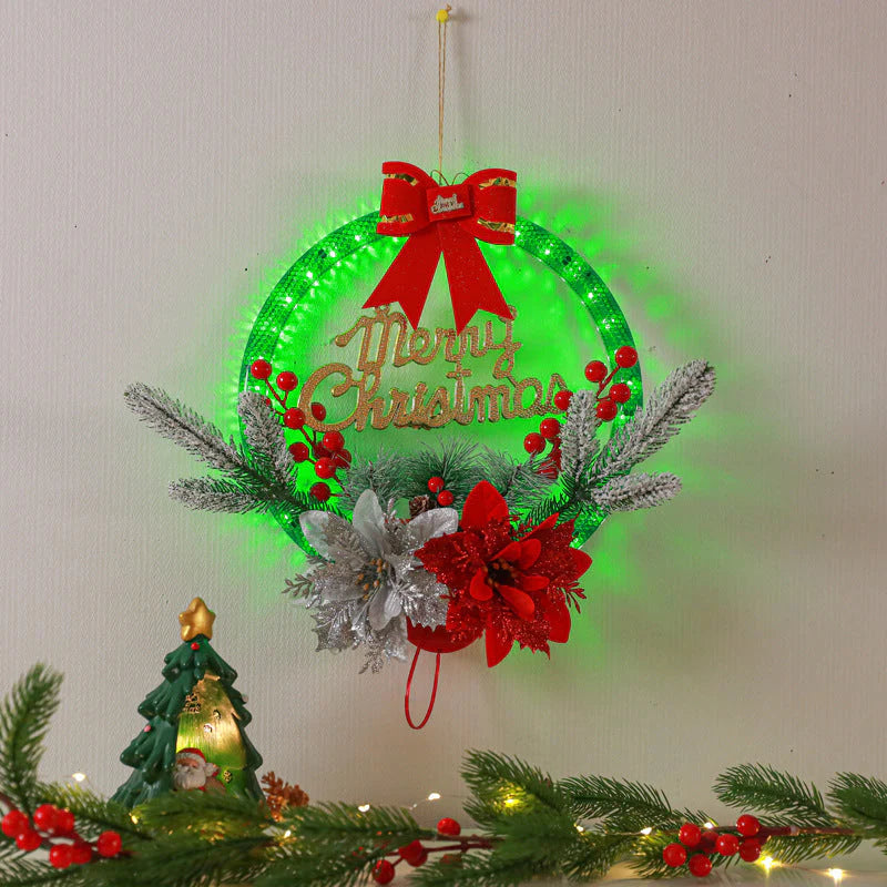 LED Christmas Wreath with Flowers & Red Bow – 30cm Festive “Merry Christmas” Hanging Decoration